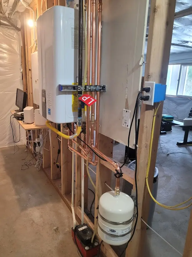 Licensed plumber repairing a kitchen sink in Mansfield